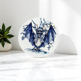 Detailed view of blue floral pattern on skull design coaster Wholesalers
4-inch Halloween coaster with standard coffee mug Bulk