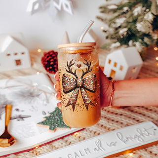 Christmas reindeer glass cup with glitter bow - holiday tumbler gift idea
Sparkly holiday glass tumbler - glitter sequin bow with reindeer antlers
Christmas gift idea - festive glitter bow tumbler cup with bamboo lid