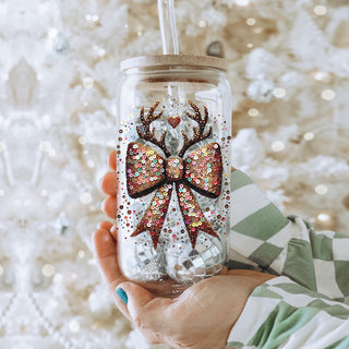 Bulk Reusable glitter tumbler for Christmas - sequin bow and reindeer holiday design
Holiday party drinkware - sparkly Christmas bow and reindeer antlers tumbler
Christmas glam tumbler - glitter bow and antlers festive glass cup