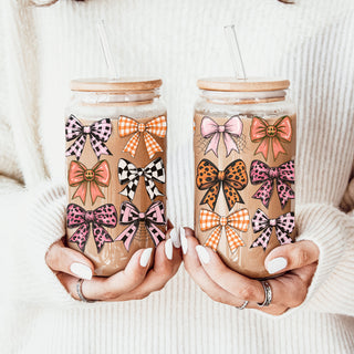 Coquette bow glass tumbler
Fall aesthetic drinking glass
Cottage core bow tumbler
Pink and orange bow drinkware