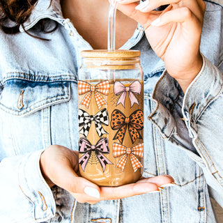Romantic fall glass tumbler with bows
Aesthetic autumn mason jar with bamboo top
Coquette style drinking glass with patterns