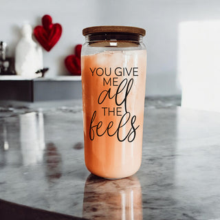 Wholesale funny V-Day gift for men, 20oz glass cup, You Give Me All the Feels.
Bulk 20oz You Give Me All the Feels glass cups with bamboo lid, perfect for stores.