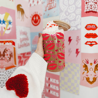 Fun and trendy 20oz glass cups with red lips and pink XOXO for a unique gift.
20oz glass tumblers with bold red lips, hearts, and XOXO for Valentine’s Day.