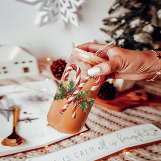 Festive drinkware gift – 17oz glass tumbler with holly wreath and candy cane design
Christmas morning coffee cup – glass tumbler with candy cane wreath wrap