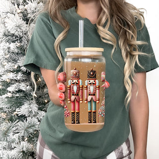 Coffee bar essential – boho Nutcracker Christmas glass cup with tree and glitter
Festive drinkware gift – pink, teal, gold Christmas glass tumbler with Nutcracker soldiers