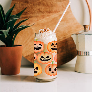 Watercolor pumpkin face glass tumbler with bamboo lid and straw
Halloween themed glass drinking cup with jack o lantern designs