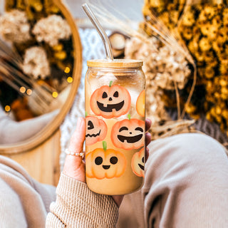 Halloween glass tumbler with straw and lid
Cute pumpkin face drinking glass for fall
Reusable Halloween mason jar with bamboo top
Halloween drinkware
Fall drinking glass