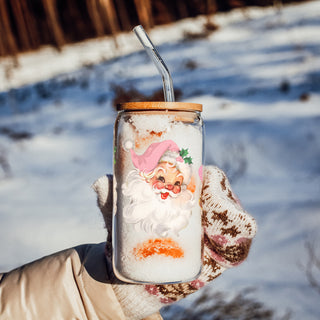 Christmas glass tumbler with pink Santa faces on coffee bar
17oz festive glass cup with vintage pink Santa faces