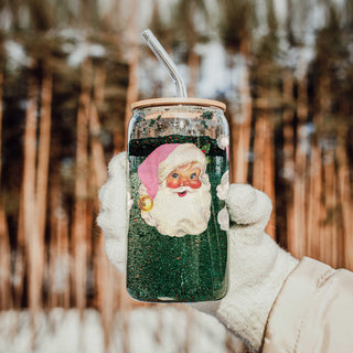 2 vintage Santa faces glass cup for Christmas
pink hat Santa holiday coffee tumbler
Christmas kitchen drinkware with vintage Santa faces