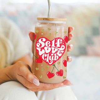 20oz glass cups with bamboo lid and glass straw featuring "Self Love Club" and red heart cherry graphics.
Retro "Self Love Club" 20oz glass cups with bamboo lid, glass straw, and gold glitter hearts.
Chic 20oz glass cups with bamboo lid and glass straw, featuring red heart and cherry graphics.
"Self Love Club" 20oz glass cups with bamboo lid, glass straw, and gold glitter hearts for a unique gift wholesalers