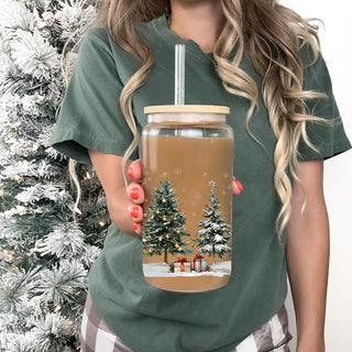 Holiday drinkware gift - reusable glass tumbler with winter wonderland theme
Christmas party glass cup - decorated Christmas trees with snow design
Festive tumbler with bamboo lid - holiday gift for coffee or tea lovers