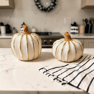 white pumpkin decor for classy halloween styling
modern halloween pumpkins white gold home decor
subtle halloween decor neutral pumpkin styling
white pumpkins for sophisticated halloween decor
minimal spooky decor white pumpkin gold accents
white pumpkin decor styled on beige tabletop aesthetic
neutral fall decor white pumpkins styled minimal home
white gold pumpkins styled coffee table fall decor
pumpkin decor styled modern neutral kitchen aesthetic