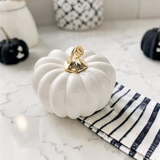 white pumpkins minimalist fall home decor
decorative pumpkins white gold neutral aesthetic
fall pumpkins white ceramic gold accent
white pumpkin set elegant fall home styling
modern pumpkin decor white gold home
neutral pumpkins white fall decor styling
white gold pumpkins home decor autumn