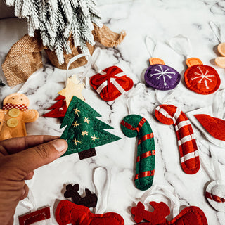 Felt Christmas advent calendar with pockets for resale
Gingerbread man ornaments handmade cotton