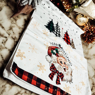 Rustic Christmas hand towel with vintage Santa and gold snowflakes
Vintage Santa Claus kitchen towel with Merry Christmas text
Christmas hand towel with traditional Santa design and gingham accents in bulk