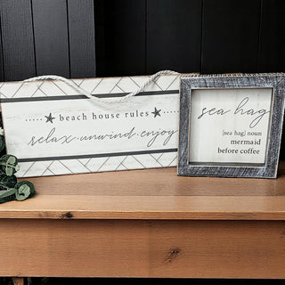 Modern beach house sign with starfish design and geometric pattern