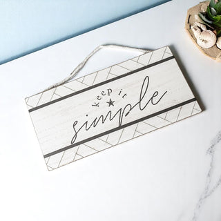 Coastal wall art with simple life message
Contemporary coastal decor with nautical rope hanging