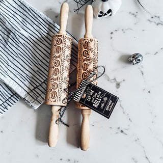 Halloween pumpkin rolling pin close up detail
embossed cookie dough rolling pin Halloween design
wooden rolling pin with engraved pumpkins
Halloween baking rolling pin on marble countertop
pumpkin pattern dough roller rustic kitchen
Halloween cookie roller with detailed imprint