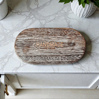 handmade wooden trinket tray rustic distressed finish
natural Paulownia wood catch all tray
small wooden jewelry tray on marble counter
rustic farmhouse wooden tray for keys and coins