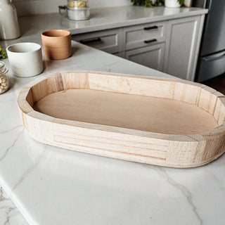 natural Paulownia wood tray for ring and watch storage
farmhouse decor wooden catchall on marble countertop
eco friendly wooden trinket tray gift for her
handmade wooden tray for nightstand clutter
narrow wooden bowl for remote control storage