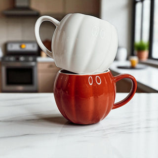 White and orange pumpkin shaped ceramic coffee mugs - handmade fall kitchen decor gifts
Fall harvest pumpkin coffee mugs - unique Halloween home decor ceramic drinkware
