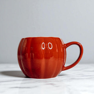 Autumn shopping pumpkin cups - October seasonal home decor accessories
Pre-Halloween pumpkin mugs - fall coffee accessories for seasonal preparation