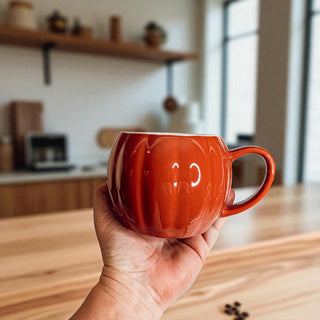 Autumn coffee experience - handcrafted pumpkin shaped ceramic cups
Fall beverage accessories - pumpkin coffee mugs for seasonal home styling