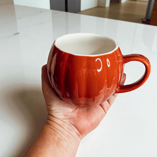 Cozy fall coffee cups - pumpkin shaped ceramic mugs for autumn mornings
Seasonal coffee ritual mugs - Halloween pumpkin ceramic drinkware set