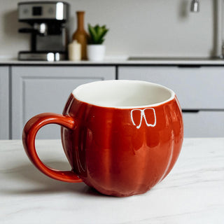Pumpkin shaped cup
Fall home accessories
Seasonal coffee mug
Holiday drinkware