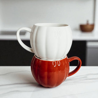 Unique fall home decor gifts - white and orange pumpkin coffee mugs for seasonal decorating