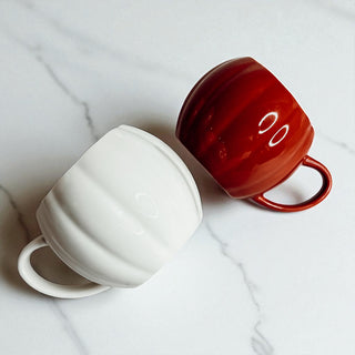 Fall pumpkin shaped ceramic mugs - Halloween coffee cups for seasonal home decor
Unique pumpkin coffee mugs in white and rust orange - fall gift ideas for coffee lovers