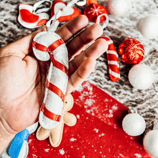 Wholesale Christmas ornaments 
stitched Christmas stocking ornament
sewn reindeer holiday ornament
handmade Christmas ornament close up
plush gingerbread ornament close up
gingerbread Christmas ornament hand held
handmade ornament product photo
Christmas ornament flat lay
handmade Christmas ornaments flat lay
plush Christmas ornament flat lay
fabric Christmas ornaments holiday display
Christmas ornaments arranged on table
handmade holiday ornament collection photo
Advent calendar lifestyle image
