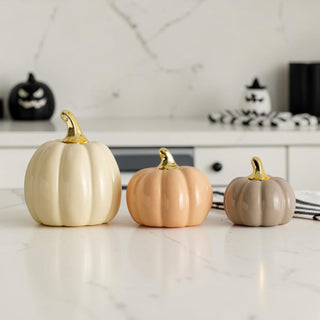 ceramic pumpkin set styled minimal home interior
autumn decor pumpkins styled on countertop
neutral pumpkins styled for fall photoshoot
modern pumpkin decor styled home setting
fall decor pumpkins styled with candles and greenery
neutral autumn decor styled kitchen scene
ceramic pumpkins styled for fall home inspiration