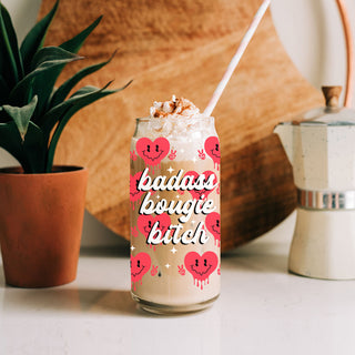 Wholesale 20oz glass cups with empowering "Badass Bougie Bitch" design.
Retro clip 20oz glass cups with smiley face candy hearts for wholesale orders.
Wholesale peace sign candy heart 20oz glass cups for Galentine’s Day gifts.