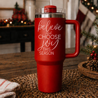 Red travel mug with motivational quote 
Christmas inspirational tumbler 40oz red - believe and choose joy this season
40oz Christmas tumbler red holiday gift
Red Christmas tumbler 40oz motivational
Christmas faith tumbler red 40oz drinkware