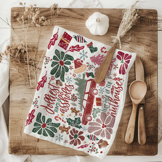 kitchen towel styled with dried florals rustic holiday
flat lay christmas towel boho decor wooden background
holiday kitchen towel styled neutral farmhouse scene
kitchen towel with floral christmas design flat lay