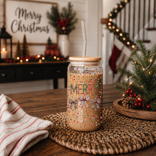 Holiday coffee tumbler – glass cup with colorful Christmas coquette bows
Christmas coffee mug – “Merry” glass tumbler with festive glitter design
Unique holiday coffee cup – sequins and glitter Christmas glass cup gift