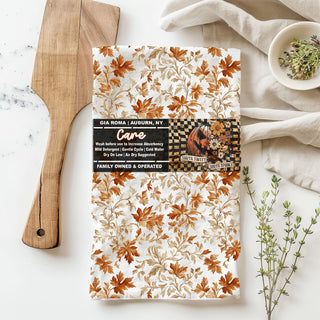 elegant fall leaf pattern tea towel in farmhouse kitchen
flour sack cotton towel with watercolor leaves
fall kitchen textiles autumn leaves printed towel
minimal white and rust leaf design dish towel
fall bar cart decor with autumn leaf kitchen towel