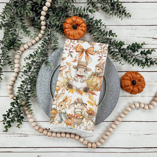 rustic fall dish towel with rabbits and pumpkins
woodland bunny flour sack towel for thanksgiving cooking
fall bunny kitchen towel 
autumn animals dish towel for cozy farmhouse kitchen
storybook bunny fall towel with pumpkins and books