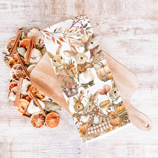 fall woodland rabbit kitchen towel hanging on oven door
pumpkin spice season bunny dish towel
autumn bunny and leaf pattern kitchen linen
cozy fall kitchen towel with rabbits and harvest scene
cozy fall vignette with bunny kitchen towel and mini pumpkins