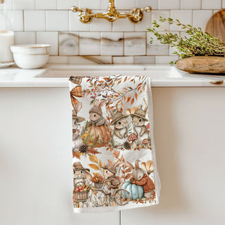 vintage style bunny illustration towel for fall décor
fall rabbit kitchen towel with cozy scarves and hats
autumn bunny cotton towel on rustic wood board
whimsical bunny fall towel for children’s kitchen décor
fall kitchen accent towel with bunnies riding bicycle