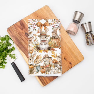 fall bunny kitchen towel with autumn colors
cute rabbit fall dish towel for farmhouse kitchen
autumn bunnies and pumpkins cotton tea towel
woodland bunny family kitchen towel for thanksgiving decor
fall rabbit print flour sack towel hanging on oven door