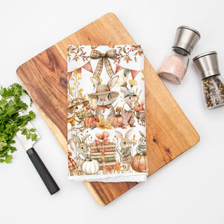 cozy cottagecore bunny and pumpkin kitchen towel
autumn bunny dish towel with leaves berries and acorns
cute bunny chef kitchen towel for fall baking days
fall harvest bunny towel with wheelbarrow of pumpkins
vintage style rabbit illustration towel for autumn kitchen