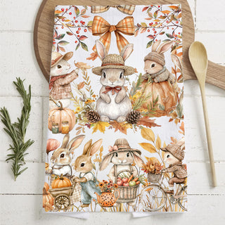 autumn rabbit print cotton towel on cutting board
fall kitchen towel with bunnies in sweaters and hats
thanksgiving bunny dish towel with pumpkins and acorns
cute bunny pushing pumpkin cart fall towel
pumpkin spice season bunny kitchen towel with warm tones
bunny with bouquet of flowers fall tea towel