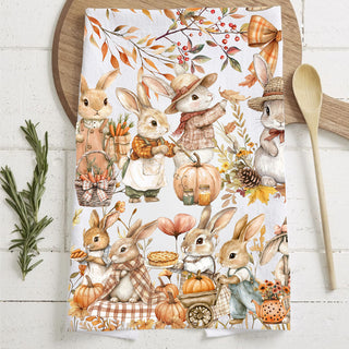 bunny themed fall tea towel on farmhouse cutting board
thanksgiving kitchen towel with cute bunnies and pumpkins
autumn bunny family towel for cozy cottage kitchen
storybook woodland bunny towel perfect for nursery or play kitchen