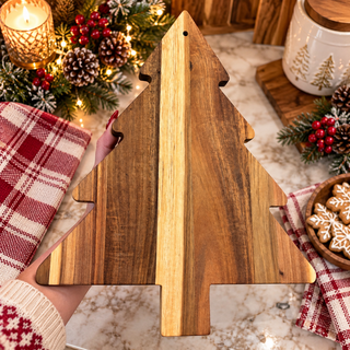 Christmas tree charcuterie board
wooden Christmas tree cutting board
Christmas charcuterie serving board
holiday tree shaped cutting board
wooden Christmas serving board
Christmas cheese board
Holiday snack board displayed on a wooden farmhouse table