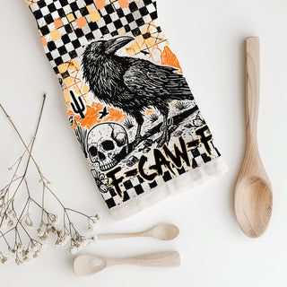 halloween party hostess gift funny crow kitchen towel
spooky aesthetic halloween towel with checkered pattern
dark academia halloween kitchen towel crow graphic
trick or treat halloween towel black raven print
horror themed halloween dish towel for creepy kitchen