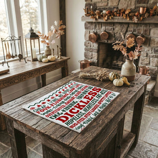 christmas towel displayed in winter decorated home
holiday towel styled with lights garland and decor
kitchen towel funny quote lifestyle christmas setting
festive towel styled farmhouse christmas background