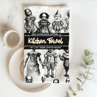 horror movie fan halloween kitchen towel with dolls
creepy porcelain doll print towel for haunted house décor
unique halloween towel with black and white clowns
disturbing clown face towel for scary halloween kitchen
