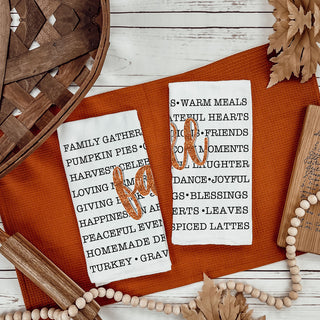 thanksgiving dish towel with fall phrases and typography
fall kitchen decor towel hanging on oven handle
Farmhouse fall words towel 
rustic fall photography with towel and black wood wall